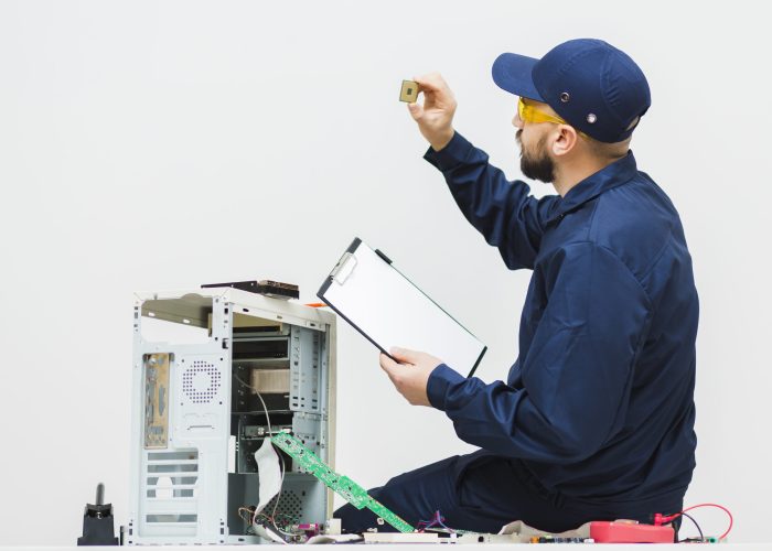 sideways-man-repairing-computer